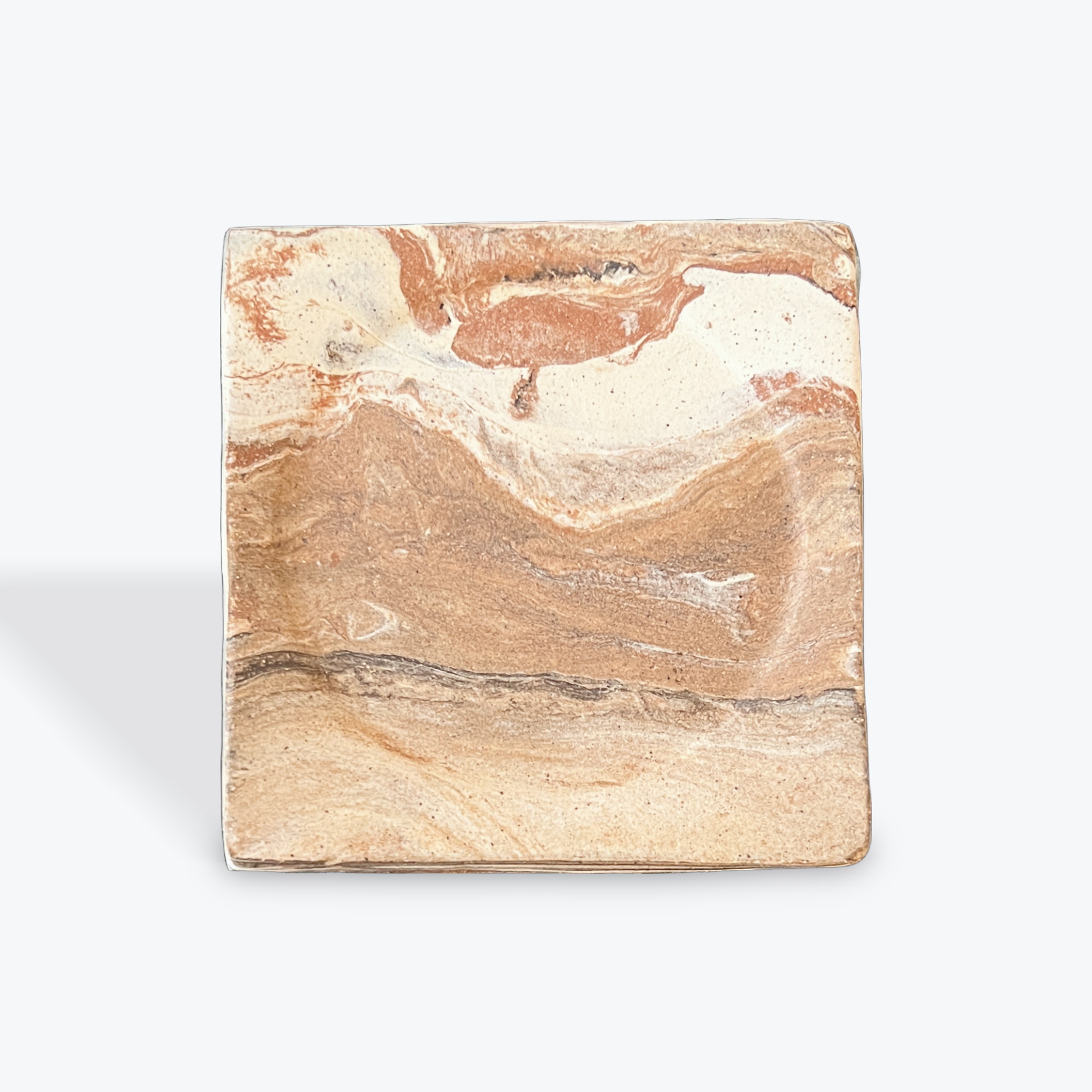 Marble-patterned square stone coaster on a white background