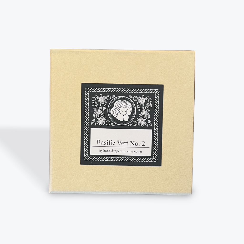 Box of Basilic Vert No. 2 incense cones with decorative label on beige background