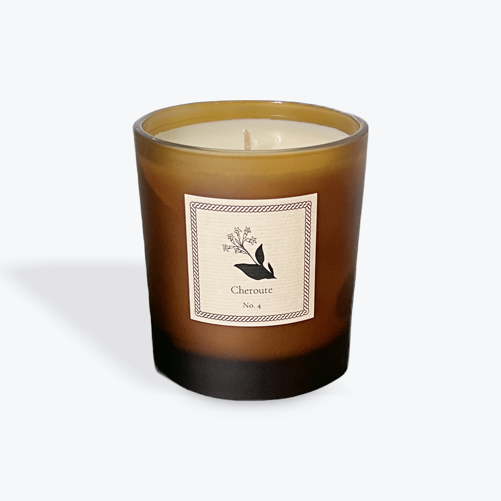 Candle with a label on a white background