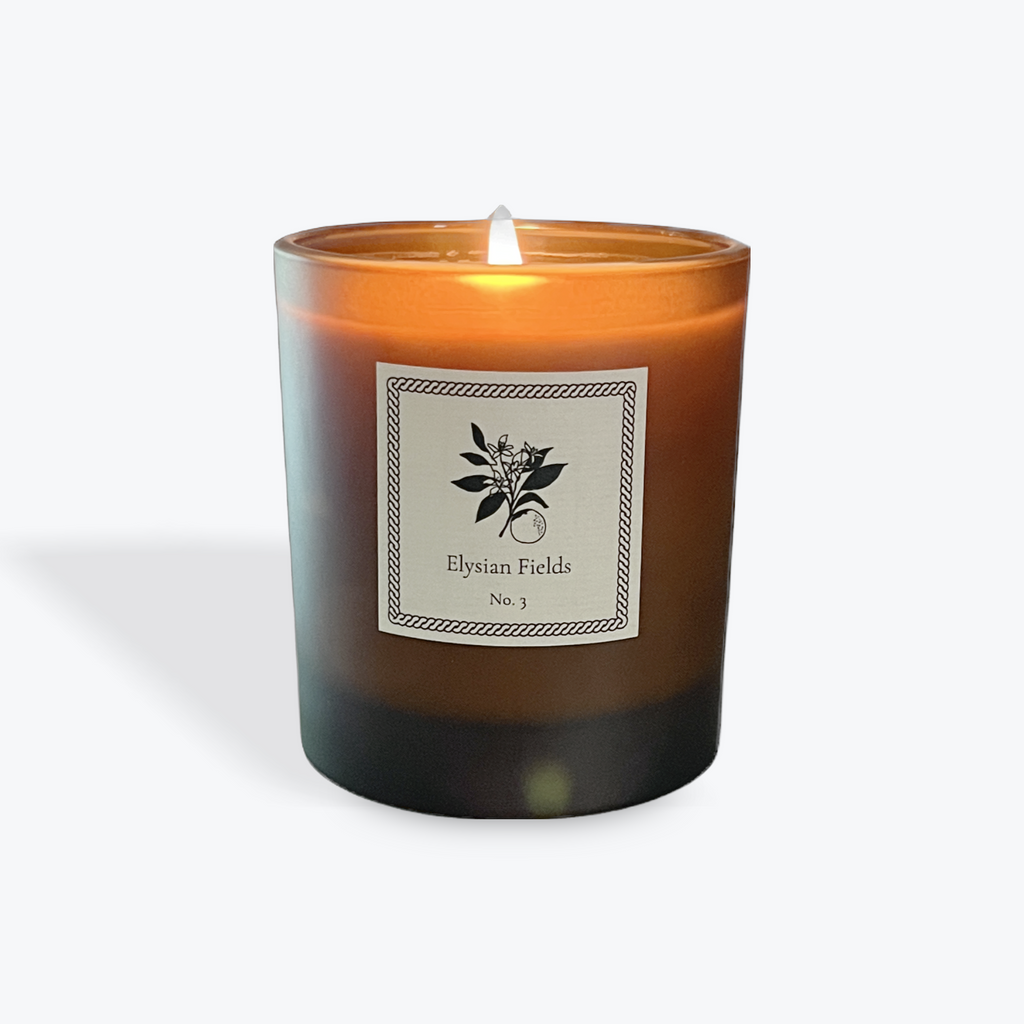 Candle with a label on a white background