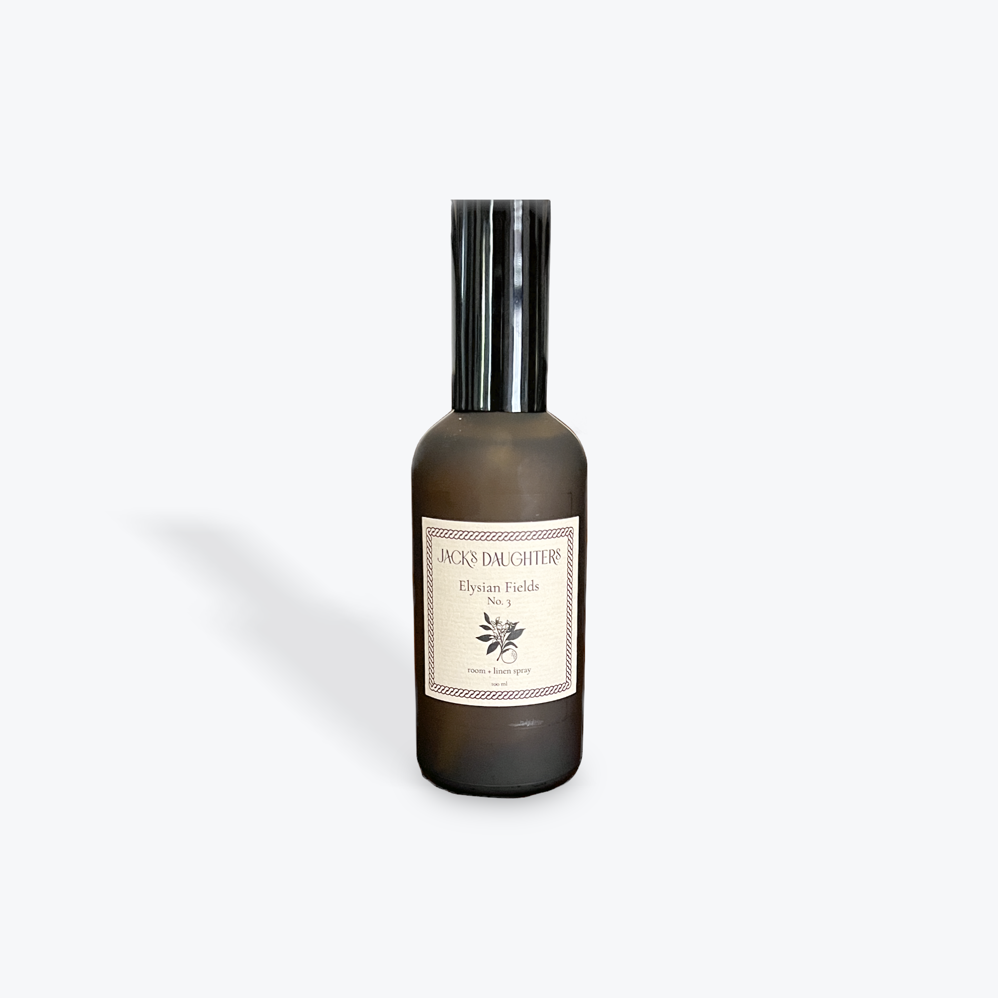Bottle of Elysian Fields room spray on a white background