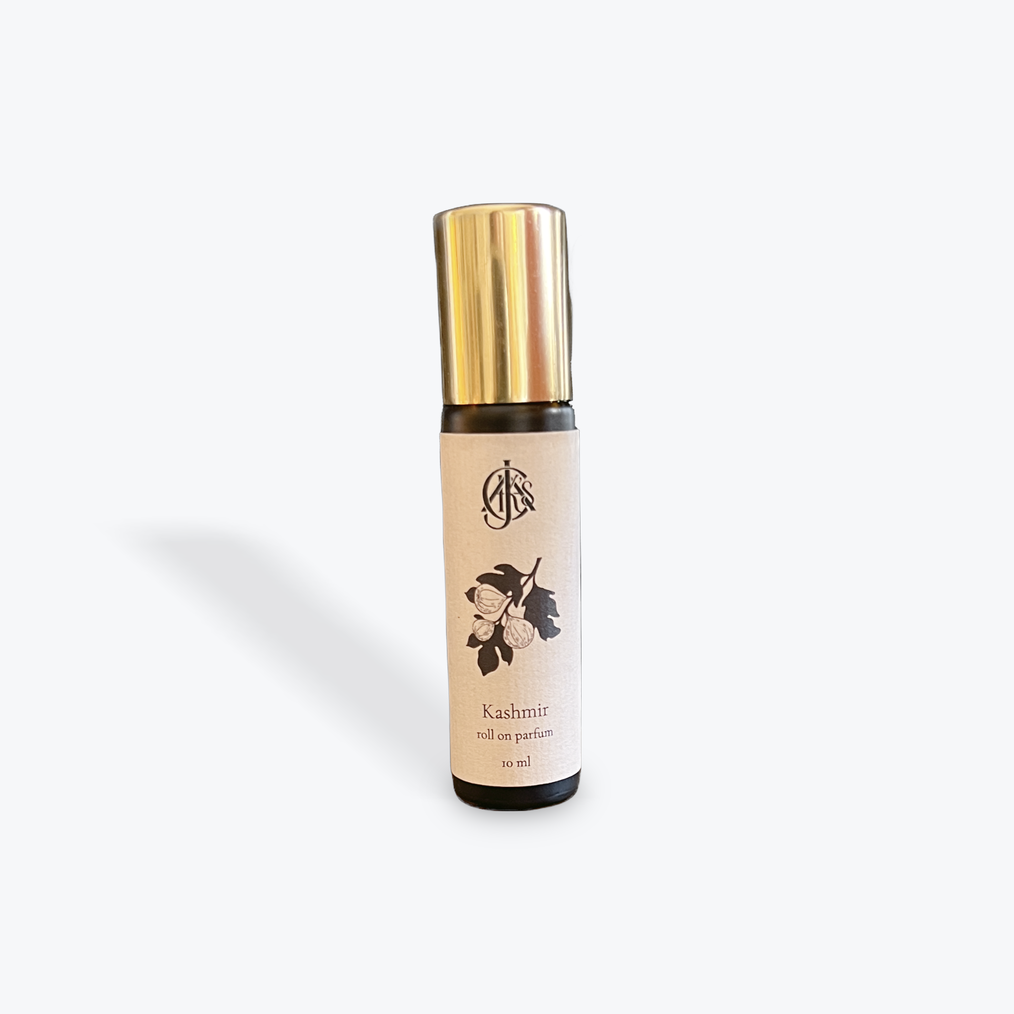 Roll-on perfume bottle labeled 'Kashmir' on a white background