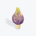 Fig shaped bottle stopper on a white background