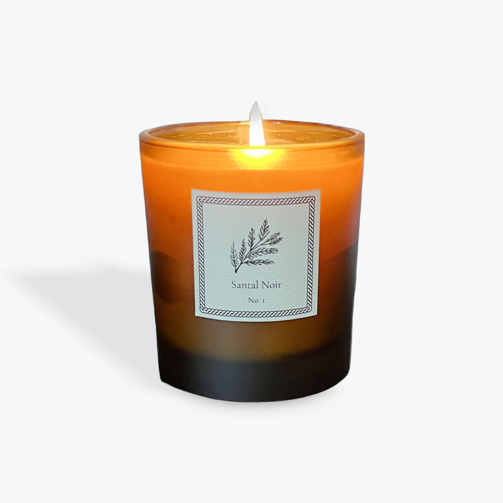 Candle with a label on a white background