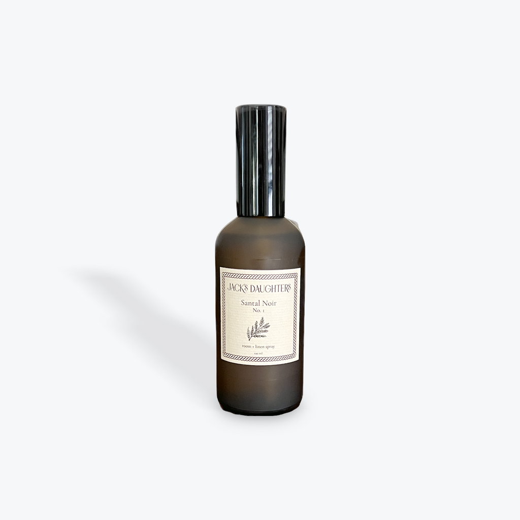 Room spray bottle with label on a white background