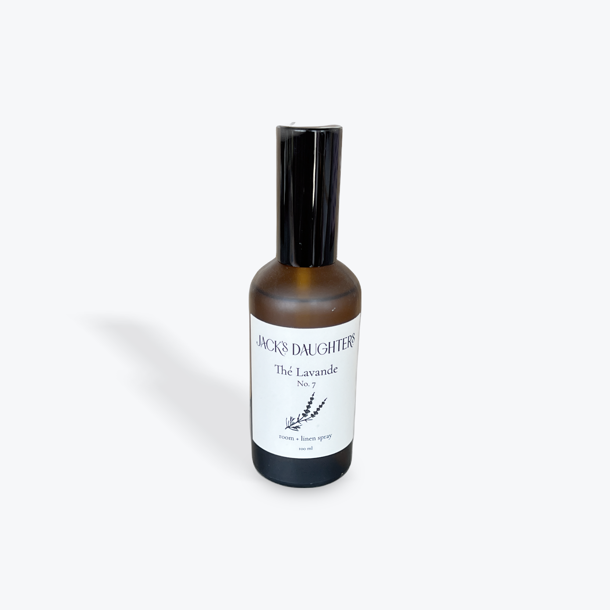 Bottle of 'Jack's Daughter' lavender body spray on a white background