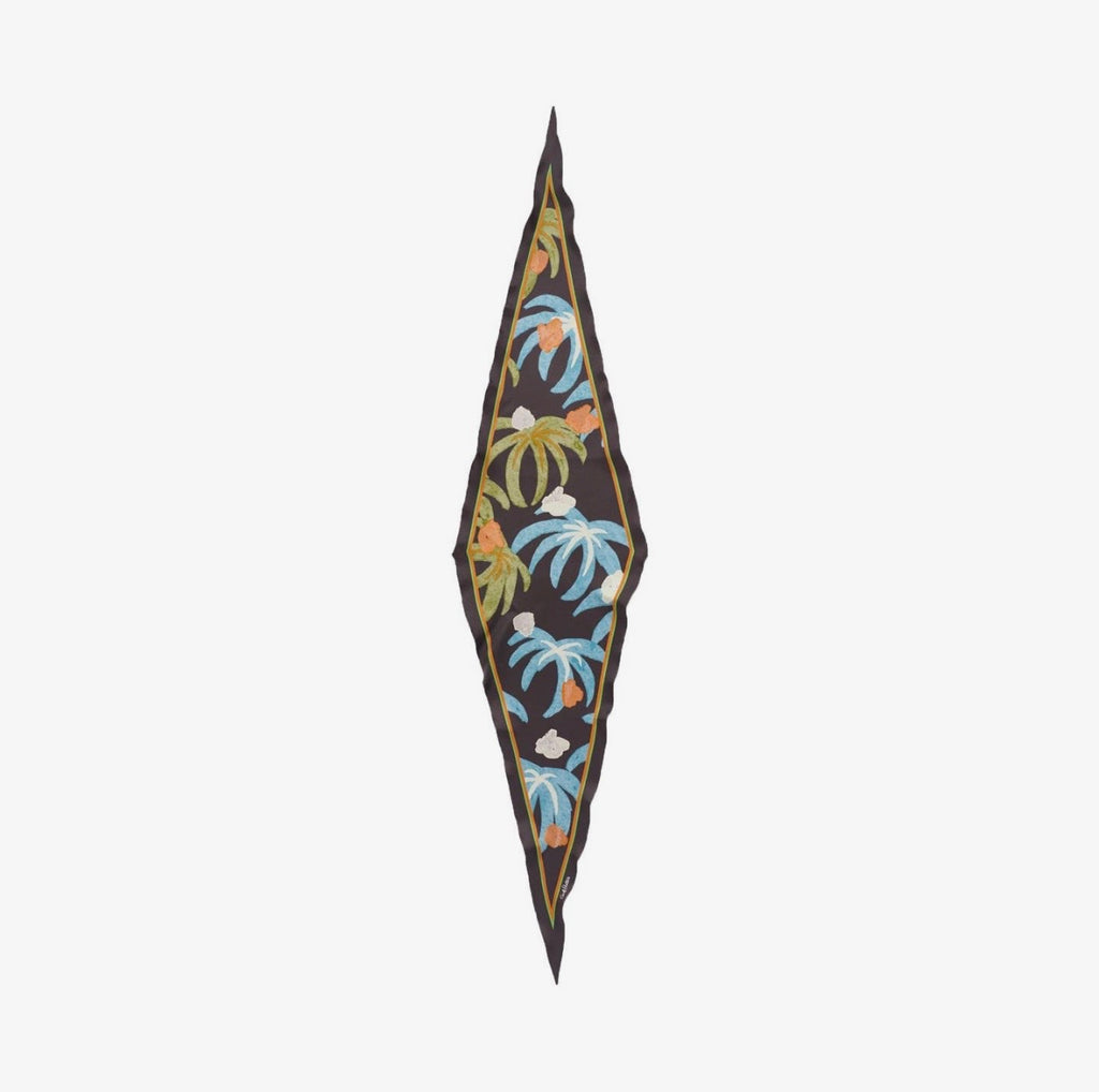 Diamond shape scarf with tropical print on a white background.