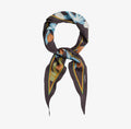 A brown, blue and orange neckerchief tied in a circle on a white background. 