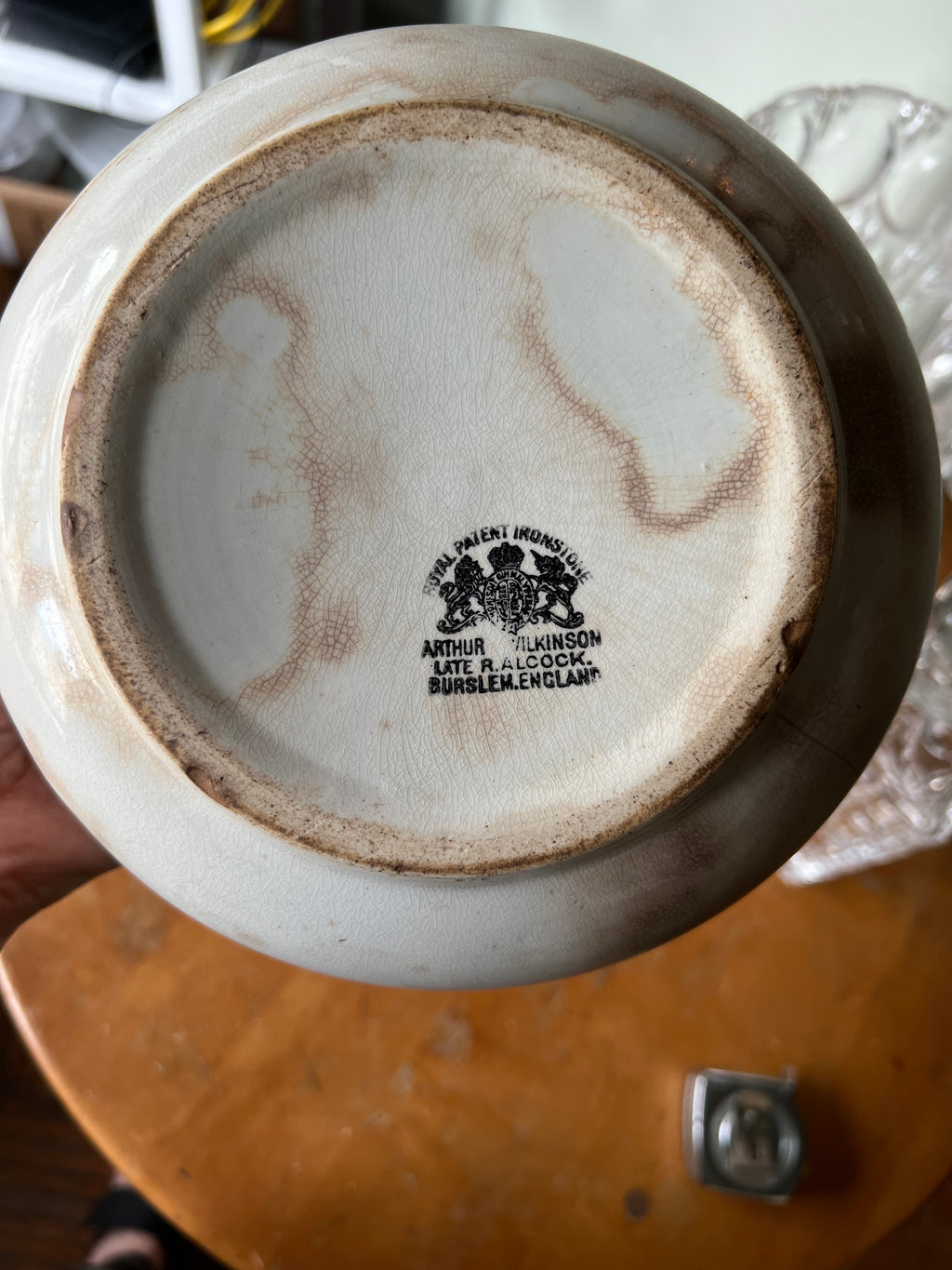 The bottom of a bowl with the stamp "royal patent ironstone"