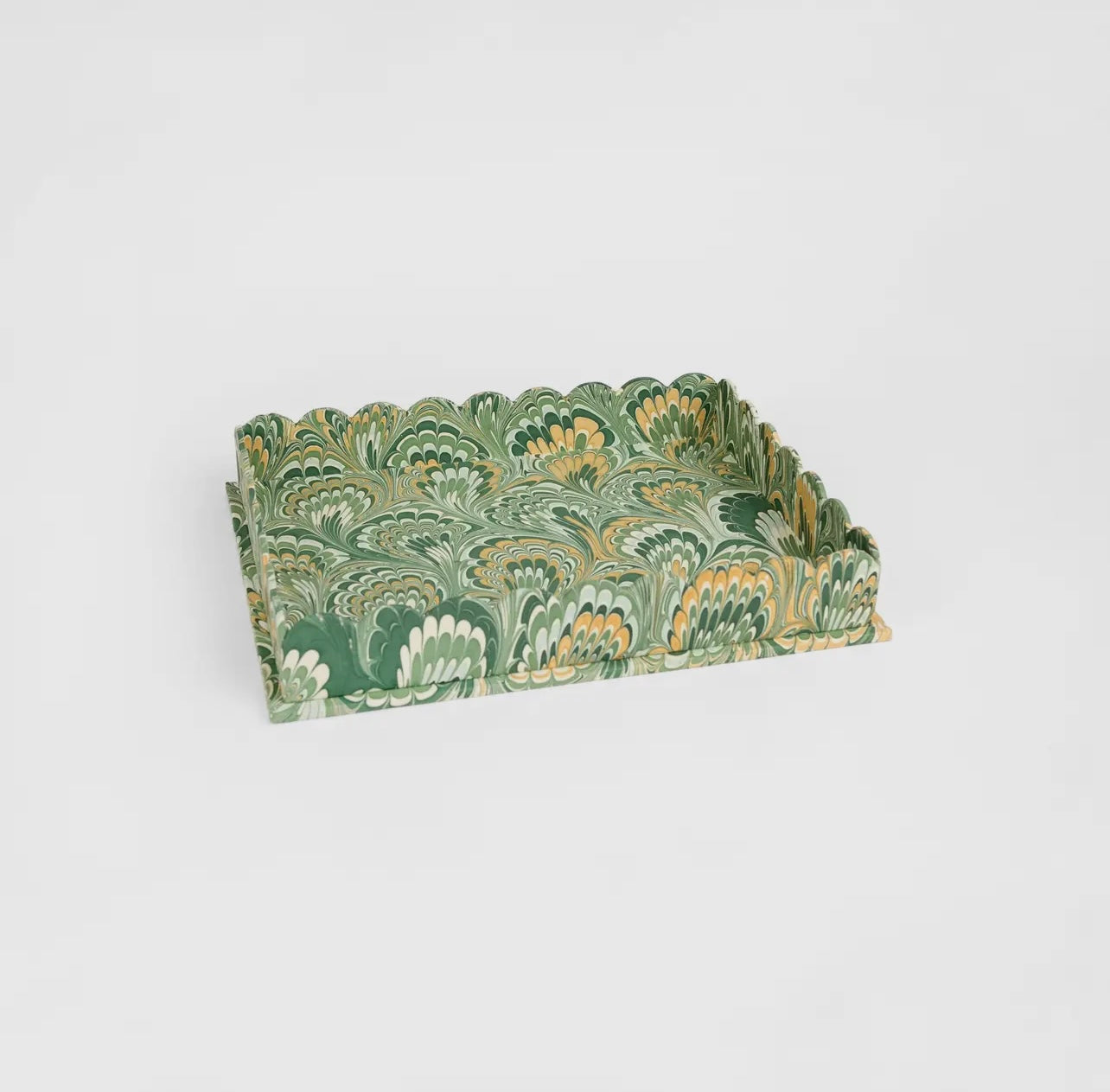Decorative green and gold patterned tray on a white background