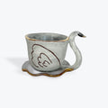 Ceramic swan teacup with a white background