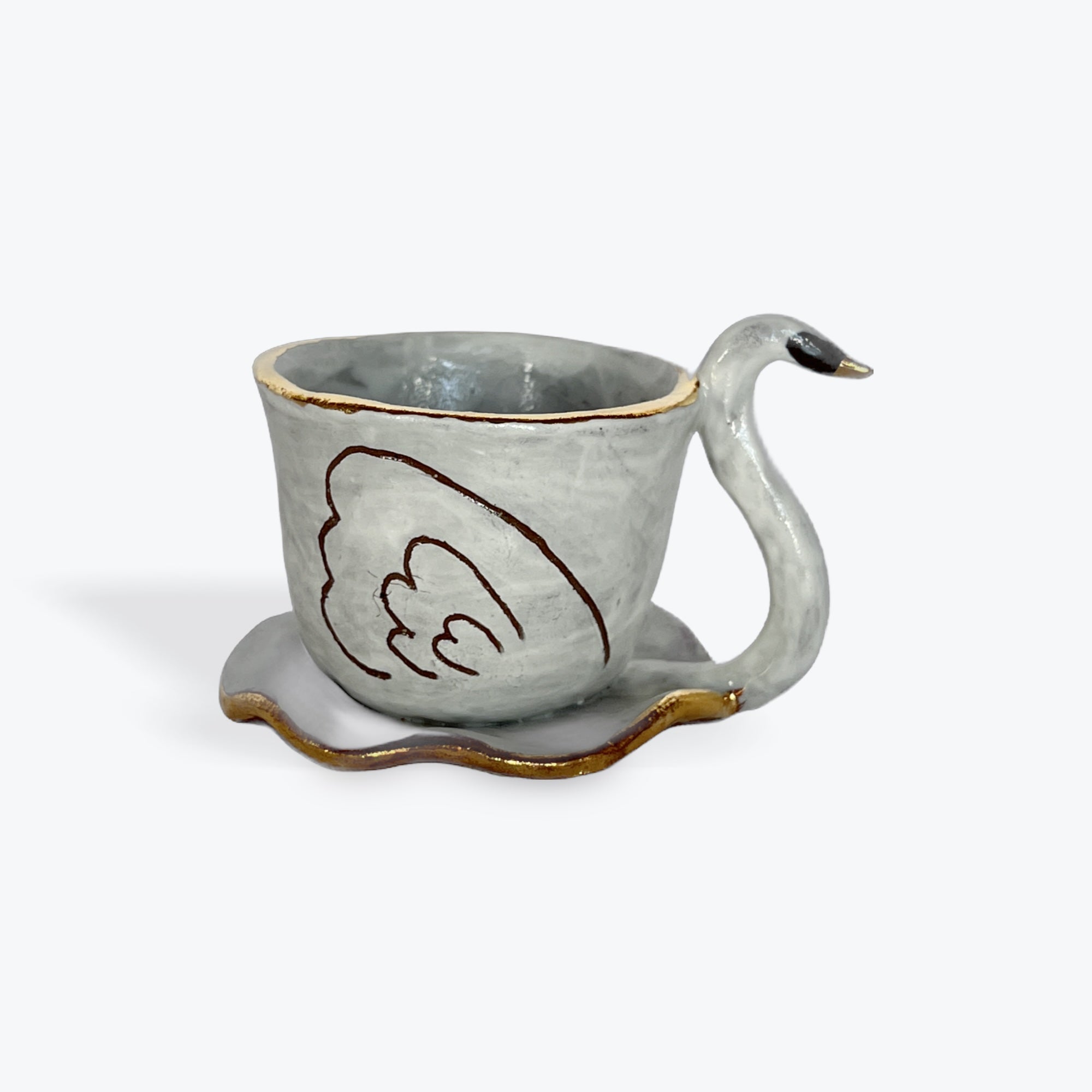 Ceramic swan teacup with a white background