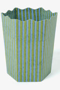 Striped bin with blue and green vertical stripes on a white background